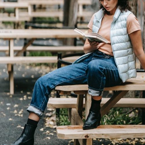 woman reading on bench, learning to be alone, Ft. Lauderdale, FL